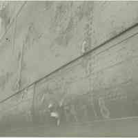 B+W photo of hull damage to an unidentified vessel at the Bethlehem Steel Shipyard, no date, ca. 1940.