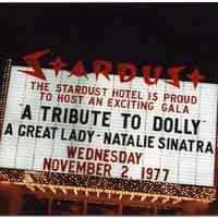 Color photo of Stardust Hotel marquee sign for "A Tribute to Dolly" Las Vegas, NV, for Nov. 2, 1977.