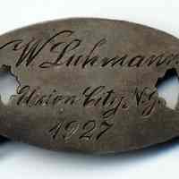          back, engraved link 6: W. Luhrmann, Union City, N.J., 1927
   