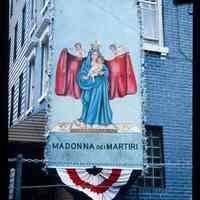 Color slide of Madonna dei Martiri on a banner.