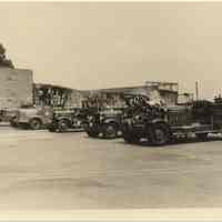 Photo of 5 Hoboken Fire Dept. trucks lined up near piers 6 & 7, Hoboken, n.d., ca. 1958-1960.