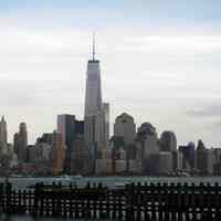          21 view southeast of World Trade Center with pilings of old piers
   