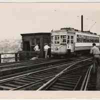 B+W photo of trolley car 2808 with signs about & on last full day of use, Hoboken, Aug. 6, 1949.