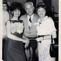 B+W photo of politician Louis DePascale with Marian Roland (left) and another woman, City Hall, Hoboken, n.d., ca. 1960-1973.