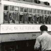          detail sign on side of trolley
   