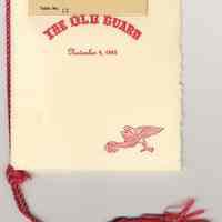          front cover; tassel + cord; name tag
   