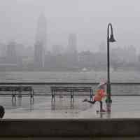          Superstorm_sandy_joe_epstein117; child on scooter near waterfront
   