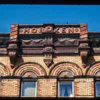 Color slide of close-up view of cornice, frieze reading "Hoboken" and brick pilasters at 320 Washington between 3rd & 4th