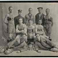 B+W printed photo of a basketball team "First" with trophy, New York, 1913.