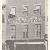 Printed B+W photograph of Daniel Cohn Loan Office (pawnbroker), 229 Washington St., Hoboken, no date, ca. 1906-1908.
