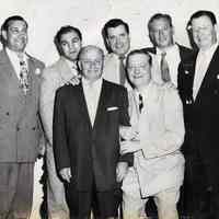 B+W photo of Marty Sinatra, Rocky Marciano, Toots Shor et al, Toots Shor