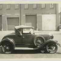 B+W photo of automobile on Park Ave. north of 14th St. across from Hostess bakery, Hoboken, Apr. 14, 1934.