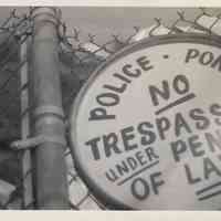 B+W photo of Hoboken Police pound fence & Hoboken Auto Body, 620 Jackson St., Hoboken, no date, ca. 1970-1975.