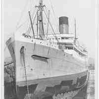 B+W photo of hull painting of the S.S. Pastores in dry dock, Hoboken, no date, ca. 1940.