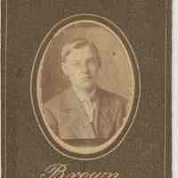 Sepia-tone photo of an unidentified boy posed in studio, Hoboken, no date, ca. 1890-1910.