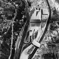 B+W aerial photo of Lincoln Tunnel, N.J. plaza with access ramp [helix] under construction, Weehawken, May 17, 1938.