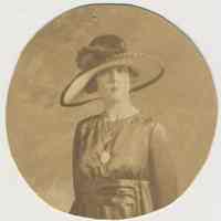 Sepia-tone photo of an unidentified woman posed in studio, Hoboken, no date, ca. 1900-1915.