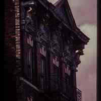          Color slide of close-up view of cornice, pediment, figurine brackets and fire escape at 712 Adams between 7th and 8th picture number 1
   