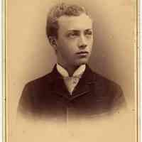 Cabinet photo of young man posed in photographer