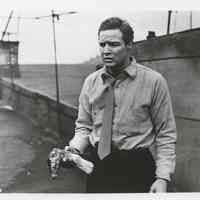 Black-and-white publicity photo of Marlon Brando as Terry Malloy in film "On the Waterfront," Hoboken, no date, ca. 1953-1954.