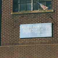 Color photo of wall sign for Allied Pump Corporation, 128 Harrison Street at Second St., Hoboken, Jan. 3 & 4, 2002.