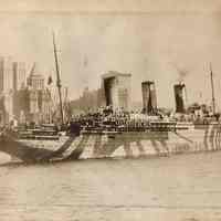 Sepia tone photo of troopship U.S.S. Leviathan on Hudson River nearing the Battery, n.d., ca. March - Dec. 1918.