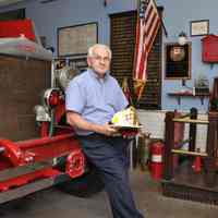 Color photo of Billy Bergin at Hoboken Fire Department Museum, 2013.