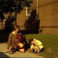 Color photo negative of Mary Ann Samperi Soule and young girl, Patricia Soule, on Hudson St. near Davidson Lab, Hoboken, no date, circa 1971.