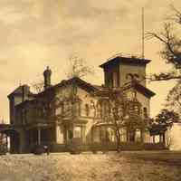 Sepia tone photo of the western side of Stevens Castle, Castle Point, Hoboken, no date, ca. 1880-1890.
