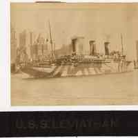          photo & tally ribbon (objects 2012.004.0010.01) arranged as framed
   