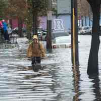          Superstorm_sandy_joe_epstein122; bicyclist in flood waters, Newark St.
   