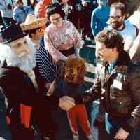 Color photo of the 1985 Hoboken Ragamuffin Parade with parents and children in costume, Hoboken, October, 1985.