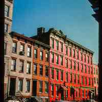 Color slide of eye-level view of row houses at an unidentified location