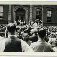 B+W photos, 4, ceremony on with patriotically decorated dais outside entrance to Public School No. 4, Park Ave. between 5th & 6th Sts., Hoboken, n.d., ca. 1941.