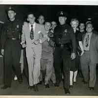 Sinatra photo: Frank Sinatra with fans & N.Y. Police officers in Grand Central Terminal, N.Y., ca. Aug. 7-8, 1943.