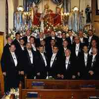          4: group posed in Saint Francis Church with Madonna statue
   