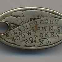 Identification tag, A. Lamprecht, and key ring belonging to Florence or Madeline Miller, 716 Garden St., Hoboken. n.d, ca. 1920-1940.