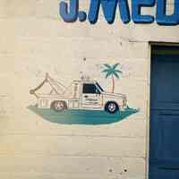 Color photo detail of painted sign on wall for J. Medina Auto Repair, near Jefferson and Fourth Sts., Hoboken, Jan. 3 & 4, 2002.