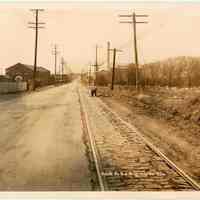 B+W photo of Hackensack Plank Road north of the Hoboken Cemetery, Bergen(?), N.J., no date, ca. 1920.