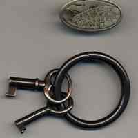          tag with key ring and two keys
   