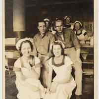 Sepia-tone group photo of Standard Brands Tea Dept. employees wearing work uniforms, Hoboken, n.d., ca. 1940.