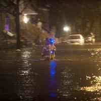          Superstorm_sandy_joe_epstein126; firemen in flood waters
   