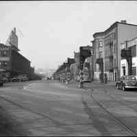 B+W photo negative of partly demolished trestle for former elevated streetcar lines on Observer Highway under demolition, Hoboken, n.d., ca. late 1949 or early 1950.