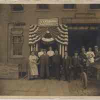 Sepia-tone photo of the exterior of a celebration at The Keystone Dairy, F. Kroog & Sons, Prop., Hoboken, nd., ca. 1903-1908.