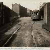 Sepia tone photos, 2, of street-level streetcar tracks running to Hoboken trolley terminal, Hudson & Ferry Sts., Hoboken, n.d. (1933.)