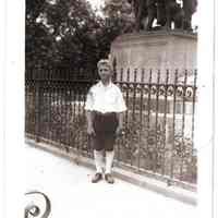 Sepia-toned photo of a young boy near World War I monument in Elysian Park, Hoboken, no date, ca. 1924-1926.