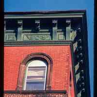          Color slide of detail view of cornice, brackets, frieze and arched window at 1201 Bloomfield on the NE corner with 12th picture number 1
   