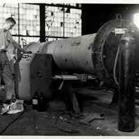 B+W photos, 3, of on-site helium leak test at M.W. Kellogg in Jersey City by United States Testing Co., Hoboken. N.d., ca. 1970s or 1980s.