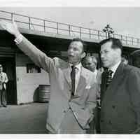Sinatra photo: Frank Sinatra at LaGuardia Airport after his arrival, with Mannie Sacks, New York, Sept. 28, 1951.