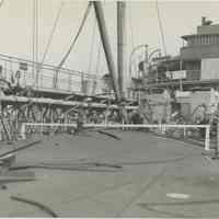 B+W photo showing damage on the main deck on unidentified vessel at the Bethlehem Steel Shipyard, Hoboken Division, no date, ca. 1940.